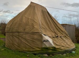 Yurt in need of maintenance as it is blowing down in a storm